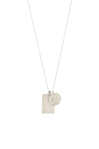Front view of Spell’s Pisces Stargazer Zodiac Necklace. The double embossed pendant charm necklace comes in 0.925 Sterling Silver and hangs from a twisted rope chain.
